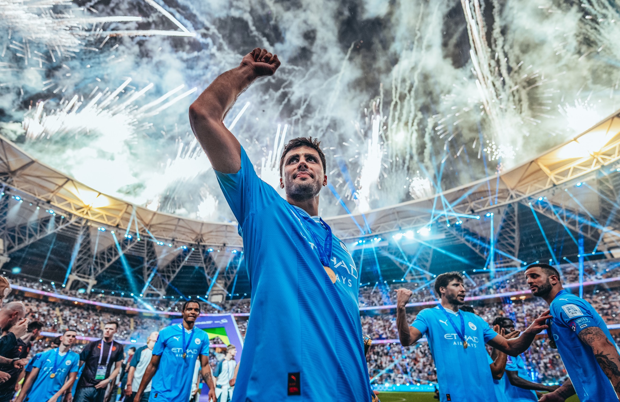 May be an image of 4 people, people playing soccer, people playing football and crowd